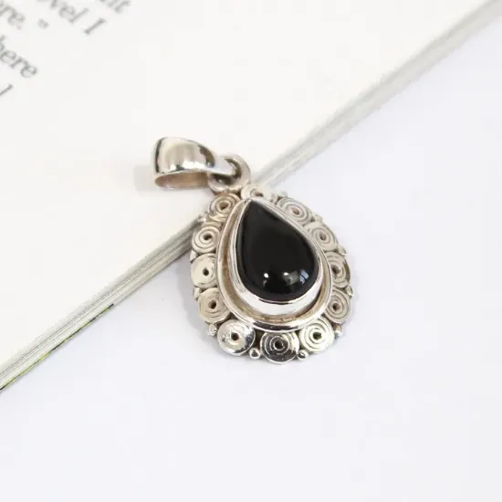 Picture of Pure silver pendant with natural Black Onyx.